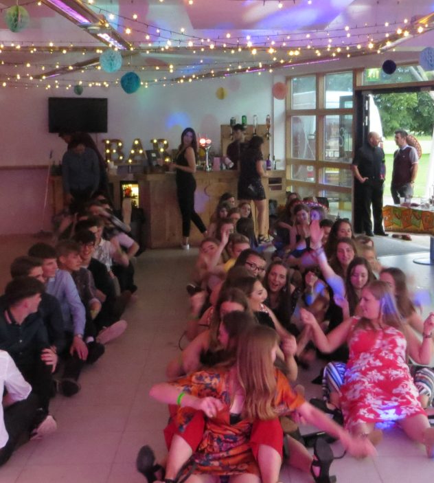 A colourful school disco with lighting effects