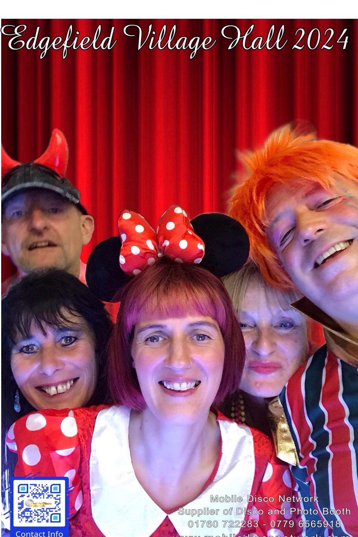 Wedding guests using the Vintage Selfie Pod photo booth in Norfolk